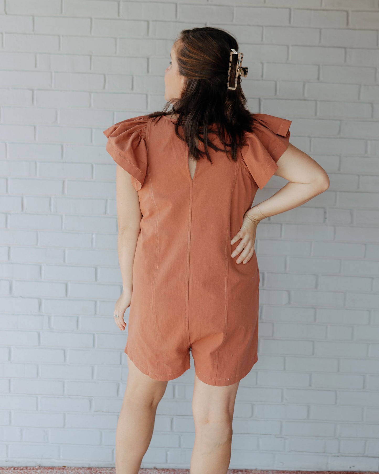 Regan Ruffle Sleeve Romper in Rust