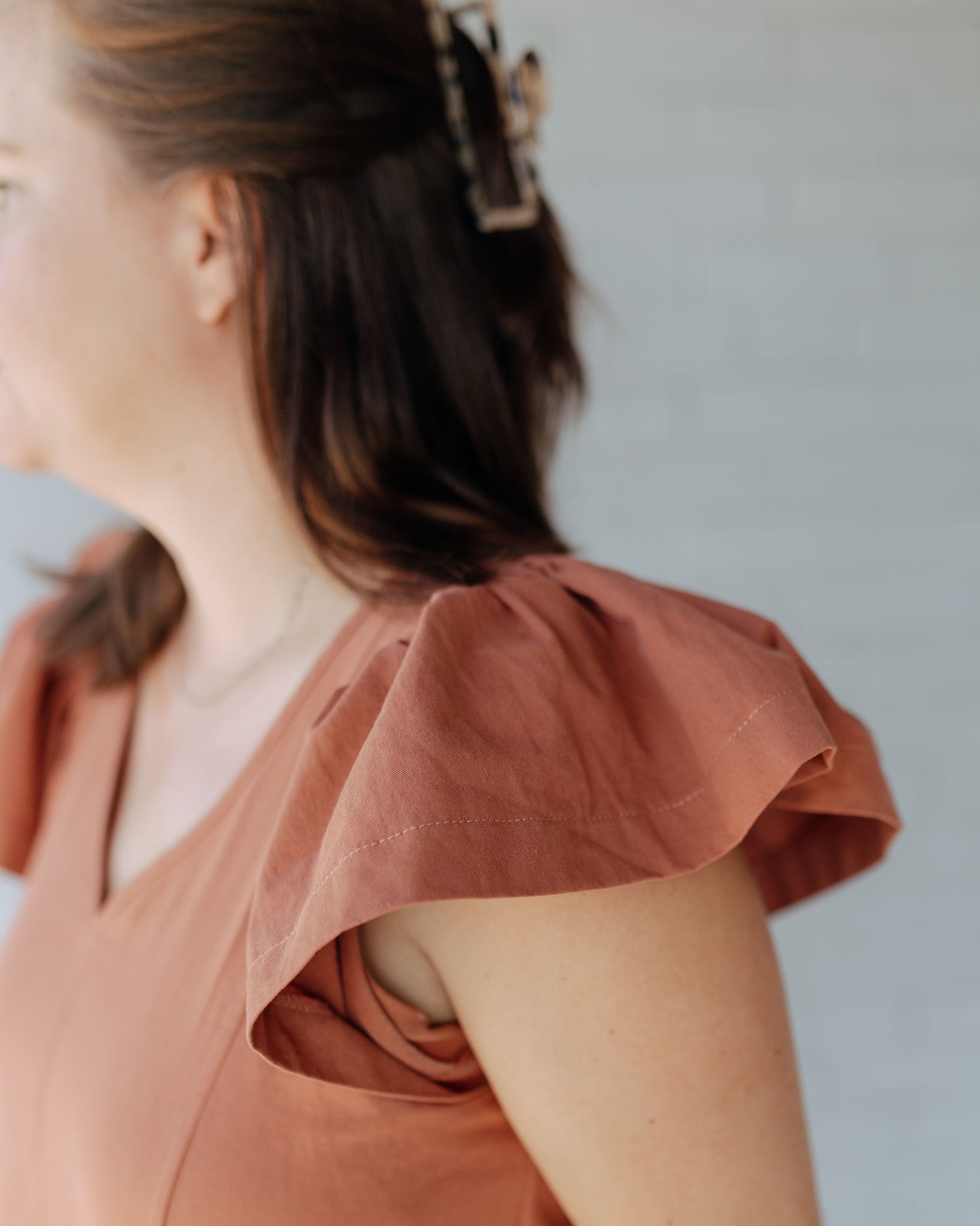 Regan Ruffle Sleeve Romper in Rust