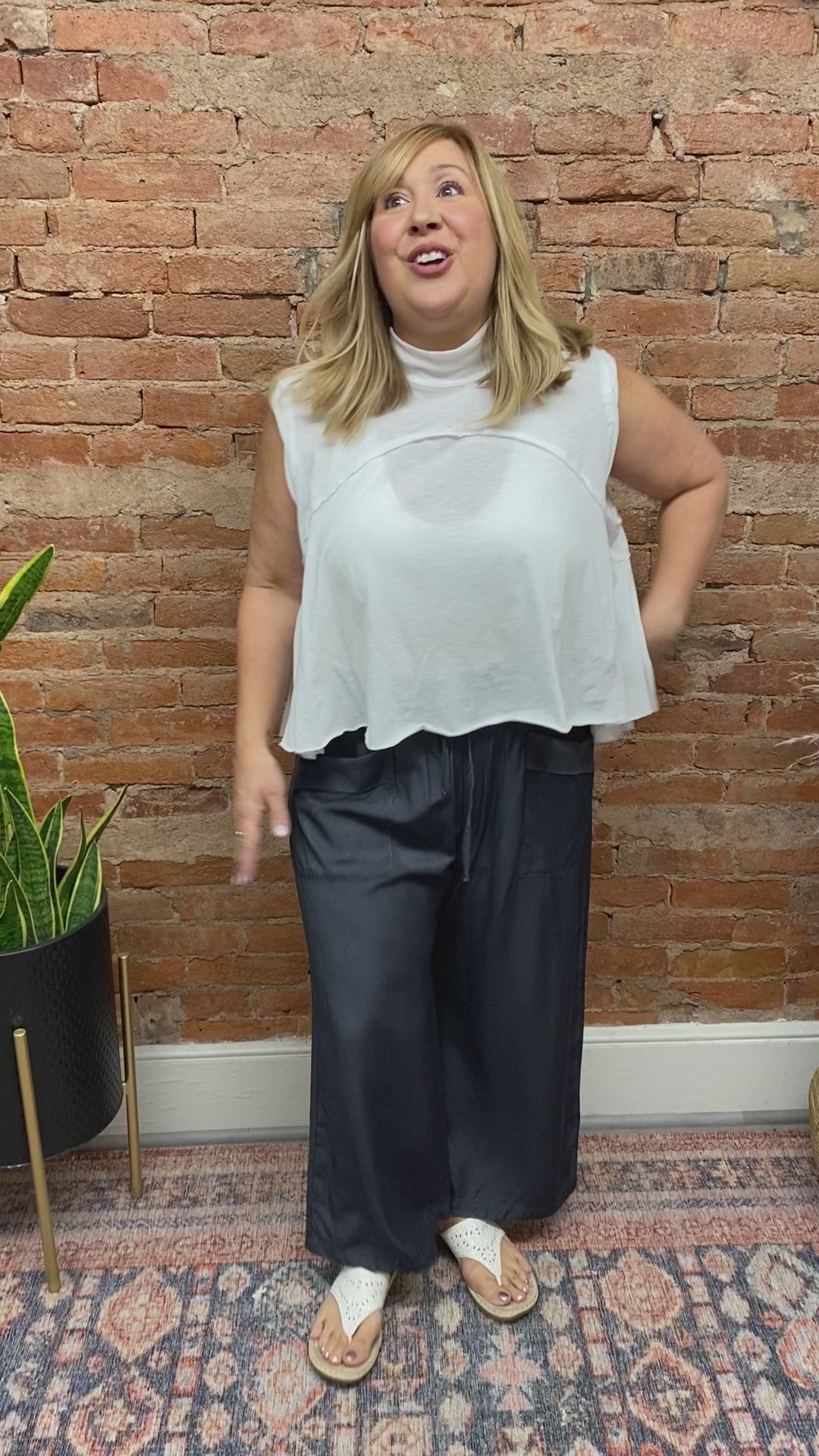 Load and play video in Gallery viewer, Trevor Mock Neck Sleeveless Top White
