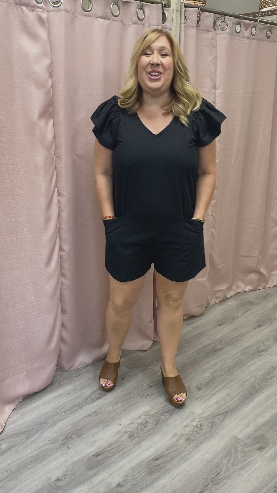Load and play video in Gallery viewer, Regan Ruffle Sleeve Romper in Black
