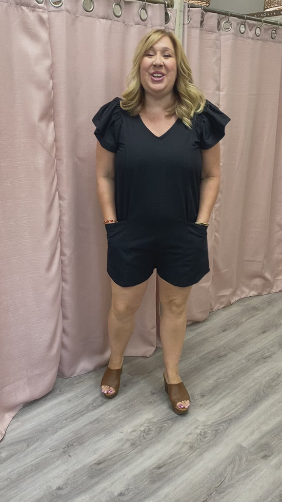 Load and play video in Gallery viewer, Regan Ruffle Sleeve Romper in Black
